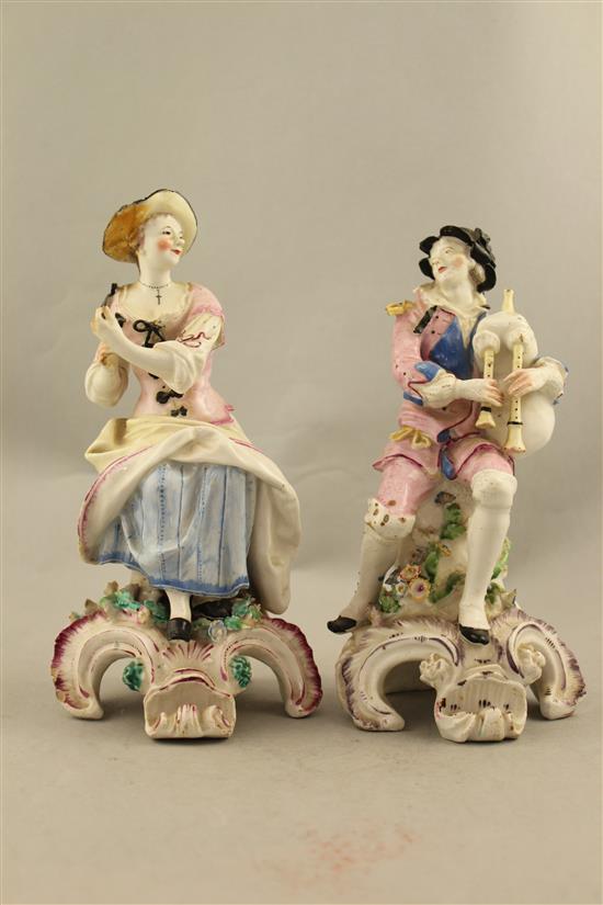 A pair of Chelsea-Derby figures of musicians, c.1775, 21.5cm, restorations